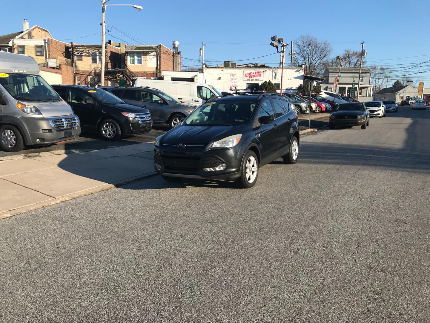 2013 Black /Black Ford Escape SE (1FMCU9G93DU) with an 2.0 V4 engine, Automatic transmission, located at 577 Chester Pike, Prospect Park, PA, 19076, (610) 237-1015, 39.886154, -75.302338 - Photo#1